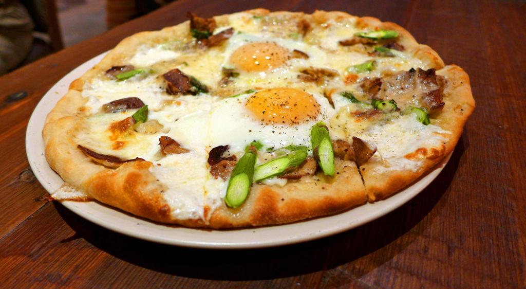 Paladar 511 signature dishes Pizza with Farm EggTuna CrudoPappardelle with Bolognese